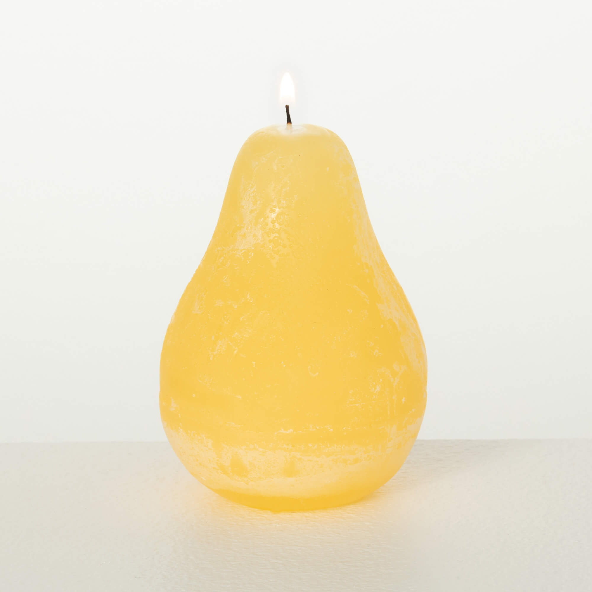Vance Kitira Timber Pear Candle – Warm Yellow – 4.5"