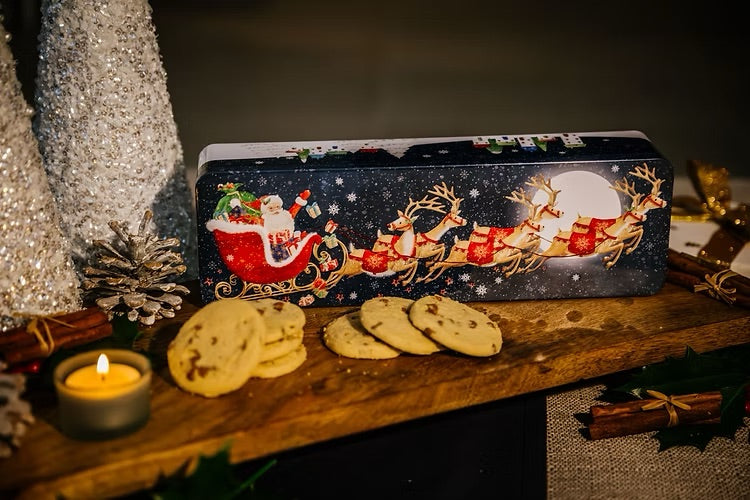 Cookie Filled Christmas Flying Santa Tin – 12" x 4" – 8oz