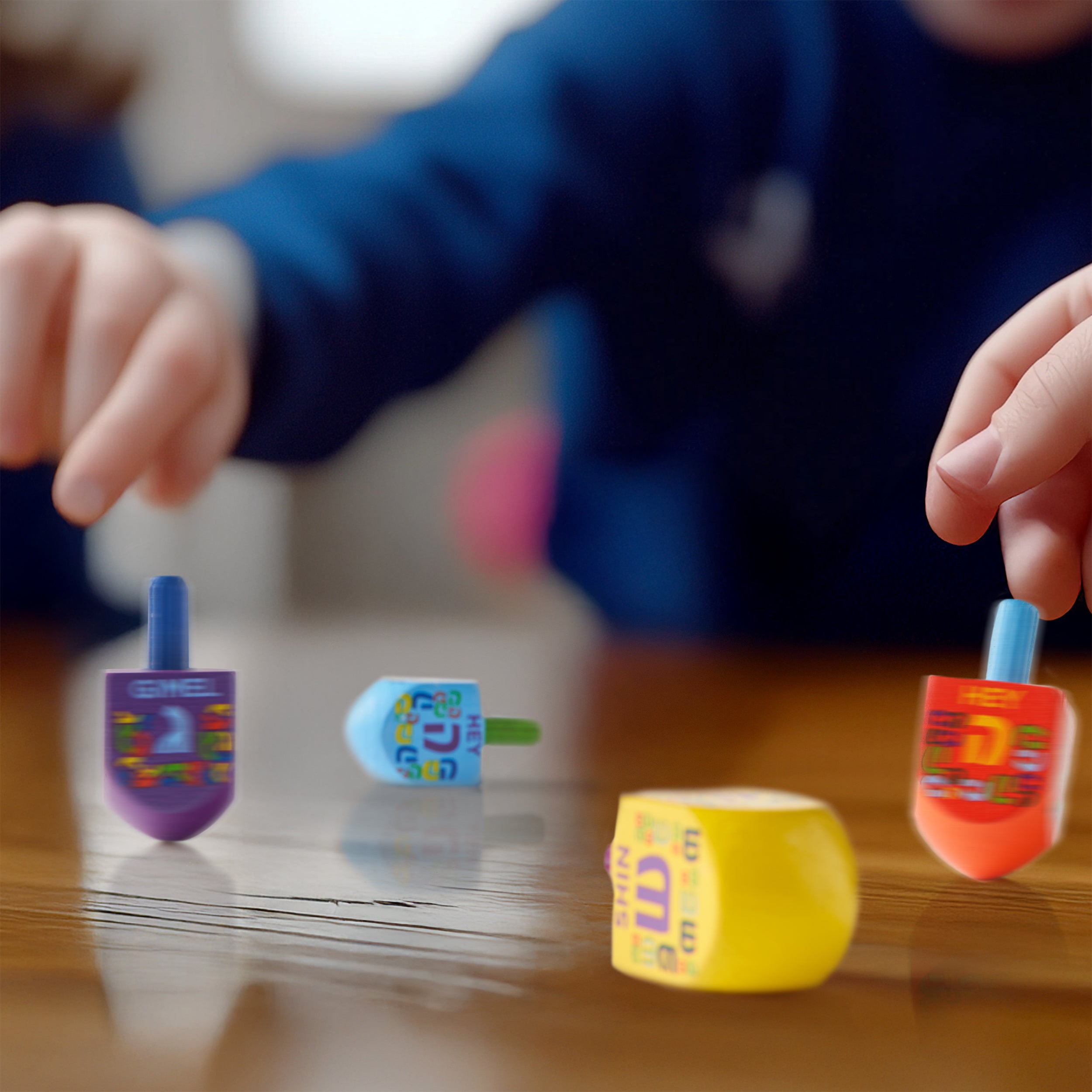 "The Dreidel Game" - 4 Small Painted Wood Dreidels